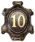 House Number Plaque, Abbildung Lackierung in Schwarz, Kupfer & Gold Patina. Die Zahlen sind flächig goldfarben bemalt.